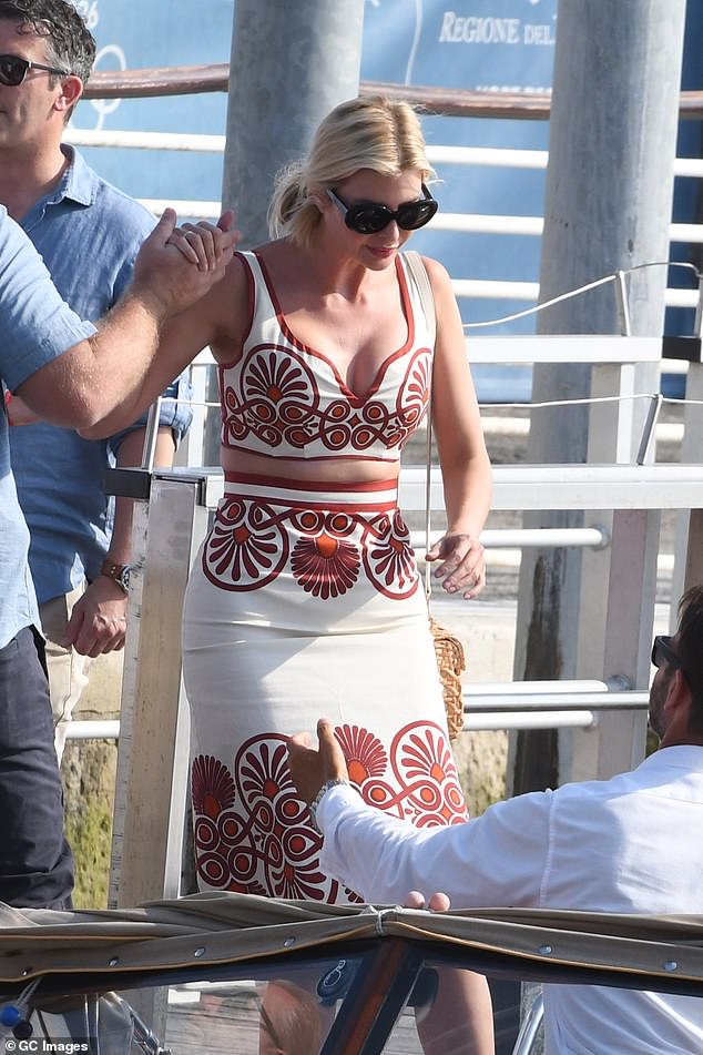 President Donald Trump¿s daughter, Ivanka, arrived at Marco Polo airport wearing a Double J bralette crop top and pencil skirt in cream with terracotta and orange medallion print details