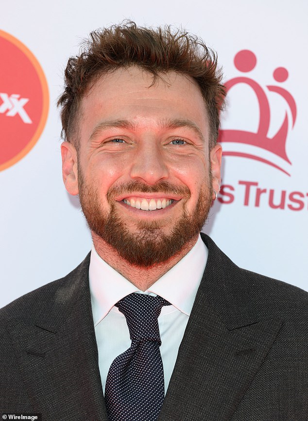 The TV personality was all smiles as he posed up a storm for the cameras