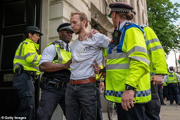 Members of the Pro-Palestinian demonstration are removed from Trafalgar Square on June 23, 2025 in London, England