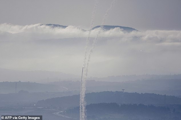 Israeli air defence systems are activated to intercept Iranian missiles over Haifa amid a fresh barrage of Iranian rockets on June 19, 2025