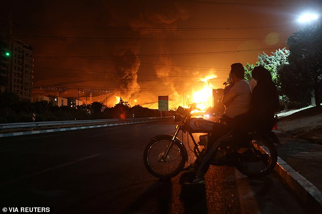 Fire of Israeli attack on Sharan Oil depot is seen following the Israeli strikes on Iran, in Tehran, Iran, June 15, 202