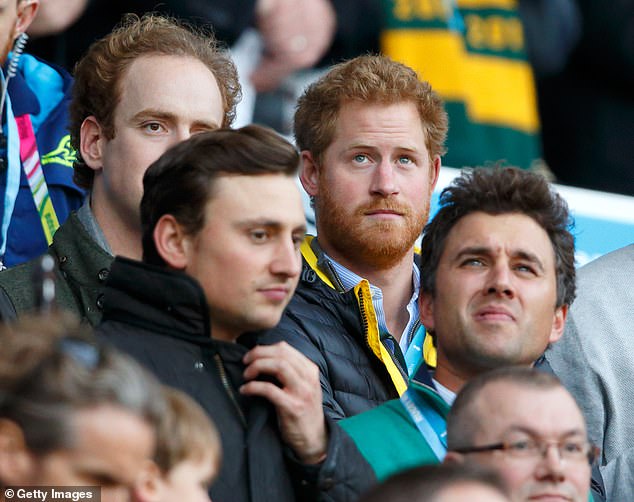Prince Harry pictured with old friends Charlie and Thomas van Straubenzee at a rugby match in 2015