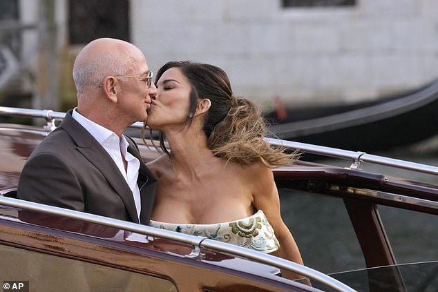 The Bezos wedding began on Thursday with the first of three days of parties in Venice – but impeccable sources reveal that the couple are already married (pictured Thursday)