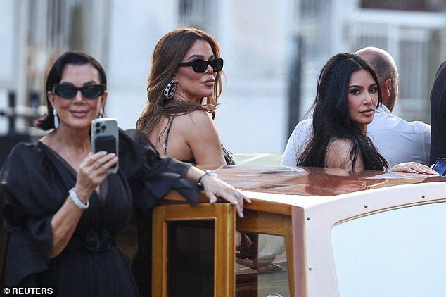 The reality TV star is at the wedding with her sister, Khloe, and their mom, Kris Jenner