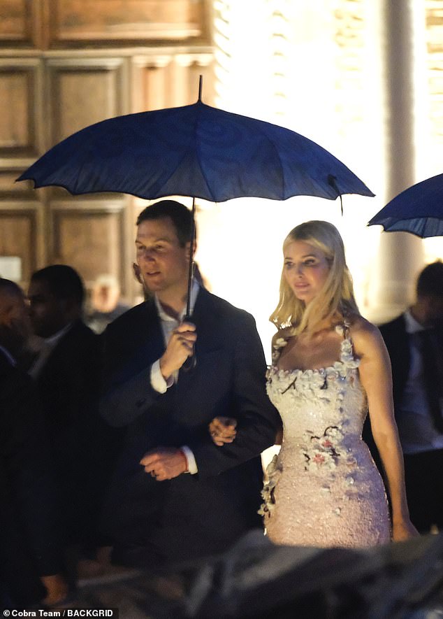 Ivanka Trump's husband Jared Kushner held an umbrella over her as they exited the party amid the unexpected downpour