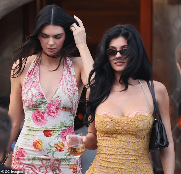 Kendall and Kylie Jenner followed closely behind their mom and famous sisters as guests made their way to the boats, which were headed to the party venue