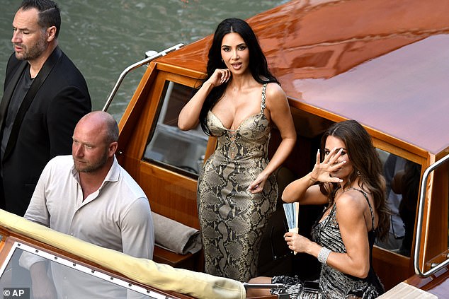 Kim and sister Khloe Kardashian seen en route to the wedding party