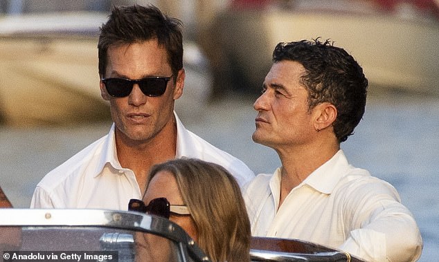 Eligible bachelors Tom Brady and Orlando Bloom looked ready to party in white button-up shirts