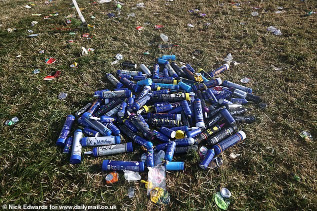 Nitrous oxide canisters left on the grass this morning as the Glastonbury Festival continues