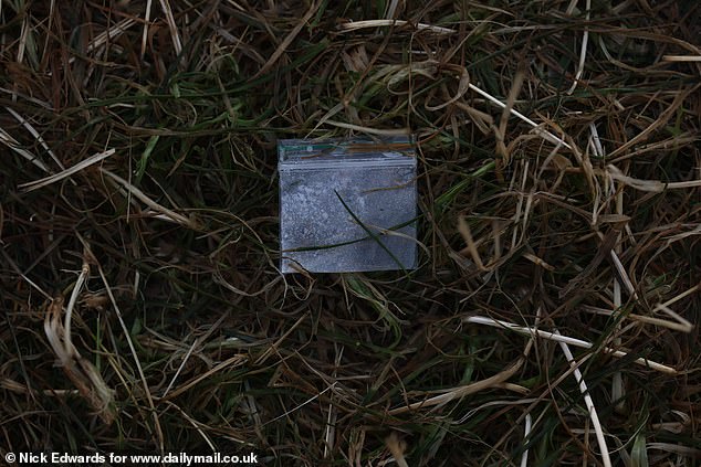 A suspicious-looking packet on the grass at the Glastonbury Festival site in Somerset today