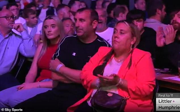 The 19-year-old beautician was spotted cheering Littler on at the O2 Arena last month