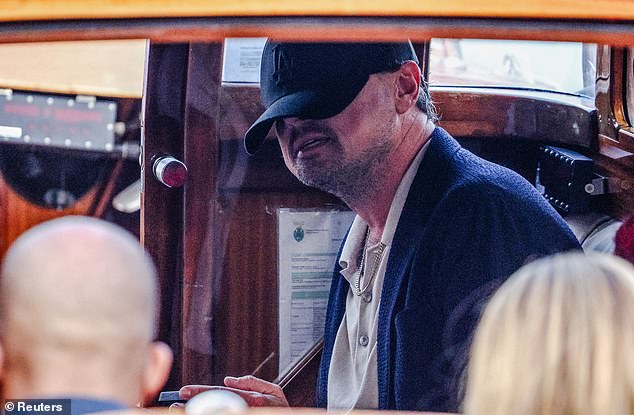 Her boyfriend Leonardo DiCaprio was also seen on the outing but kept a low-profile as he followed on behind her