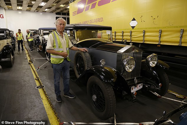 Mr Fitton, a former scrapyard owner, has spent years rebuilding the Rolls Royce's engine and exhibiting it around the globe. Pictured: With other Rolls Royces on the ferry