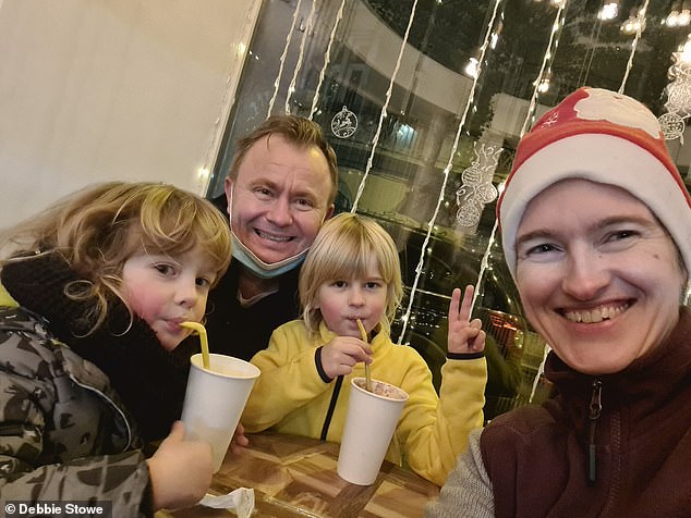 Debbie, pictured with her family, says salaries have soared since Romania joined the EU in 2007 with average take-home pay now around £960 a month