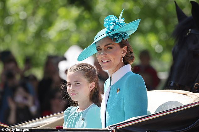 Wearing coordinating aquamarine, the Princess of Wales shared a carriage with her daughter, Princess Charlotte, as they headed out from Buckingham Palace to Trooping the Colour on June 14