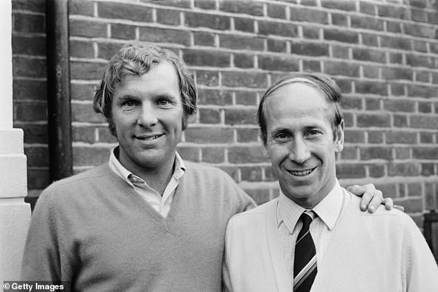 Knighthoods die with the recipient and cannot be granted posthumously (pictured: Moore with his arm around fellow England great Sir Bobby Charlton, who was knighted in 1994)