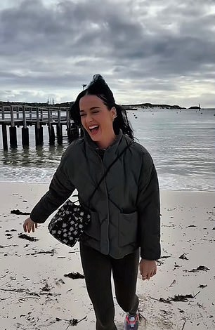 Katy Perry today out a brave face on the break up, smiling while in Australia on tour