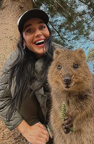 Katy Perry today out a brave face on the break up, smiling while in Australia on tour