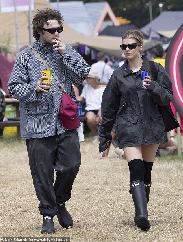 Lennon Gallagher and his girlfriend Isobel Richmond were seen wandering the grounds