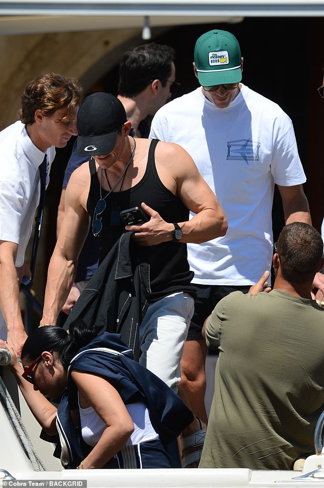 Orlando Bloom and Tom Brady back on the water this afternoon