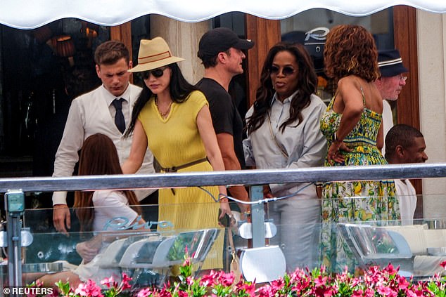 Orlando was also seen chatting to Oprah Winfrey and Gayle King today