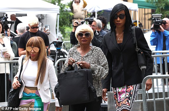 Janice Combs (C), mother of Sean "Diddy" Combs, arrives at federal court in Manhattan for Sean "Diddy" Combs' sex trafficking trial on June 27, 2025, in New York City. Sean "Diddy" Combs's lawyers will deliver their closing arguments in his defense Friday, one day after the prosecution spent nearly five hours detailing a "climate of fear" they say he created as the alleged head of a decades-long criminal ring. Combs, the 55-year-old music mogul who faces upwards of life in prison if convicted on charges including racketeering and sex trafficking. (Photo by TIMOTHY A. CLARY / AFP) (Photo by TIMOTHY A. CLARY/AFP via Getty Images)