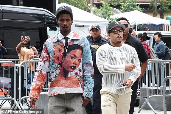 Sons of Sean "Diddy" Combs, King Combs (L) and Justin Combs (R), arrive at federal court in Manhattan for Sean "Diddy" Combs' sex trafficking trial on June 27, 2025, in New York City. Sean "Diddy" Combs's lawyers will deliver their closing arguments in his defense Friday, one day after the prosecution spent nearly five hours detailing a "climate of fear" they say he created as the alleged head of a decades-long criminal ring. Combs, the 55-year-old music mogul who faces upwards of life in prison if convicted on charges including racketeering and sex trafficking. (Photo by TIMOTHY A. CLARY / AFP) (Photo by TIMOTHY A. CLARY/AFP via Getty Images)