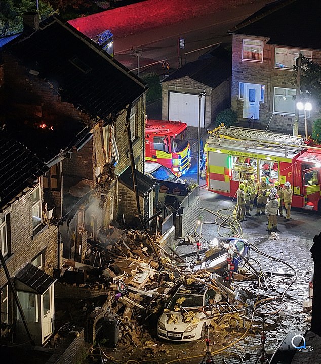 In an updated statement on the explosion, West Yorkshire Police confirmed that a 'large number of butane gas cannisters' had been found at the property and that they were 'forming part of our ongoing enquiries'