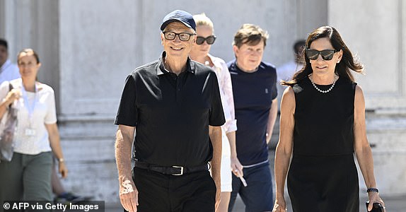 US tech entrepreneur Bill Gates and partner Paula Hurd leave after a visit at the Gallerie dell'Accademia di Venezia, ahead of US Amazon founder Jeff Bezos' wedding with Lauren Sanchez, on June 27, 2025.  (Photo by ANDREA PATTARO / AFP) (Photo by ANDREA PATTARO/AFP via Getty Images)