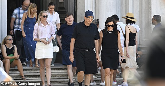 US tech entrepreneur Bill Gates and partner Paula Hurd leave after a visit at the Gallerie dell'Accademia di Venezia, ahead of US Amazon founder Jeff Bezos' wedding with Lauren Sanchez, on June 27, 2025.  (Photo by ANDREA PATTARO / AFP) (Photo by ANDREA PATTARO/AFP via Getty Images)