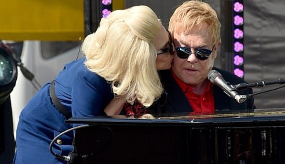 Elton John (L) and Lady Gaga perform live on the Sunset Strip