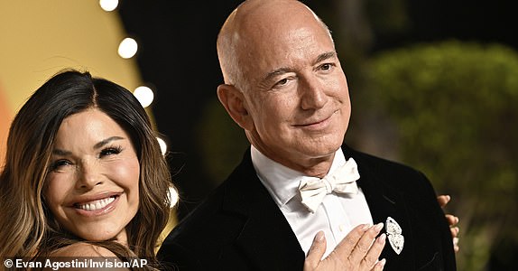 FILE - Lauren Sanchez and Jeff Bezos arrives at the Vanity Fair Oscar Party at the Wallis Annenberg Center for the Performing Arts in Beverly Hills, Calif., March 2, 2025. (Photo by Evan Agostini/Invision/AP File)