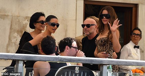 VENICE, ITALY - JUNE 26: Kim Kardashian, KhloÃ© Kardashian, Kris Jenner and Domenico Dolce ahead of Jeff Bezos and Lauren Sanchez Wedding on June 26, 2025 in Venice, Italy. (Photo by Luigi Iorio/GC Images) with Orlando Bloom in the Black vest