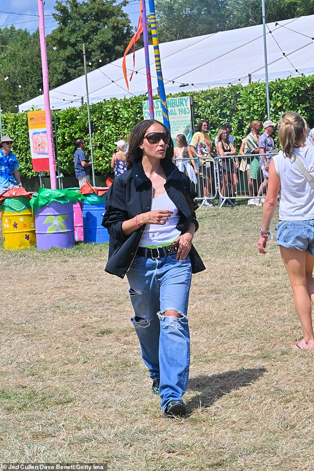 Adwoa Aboah looked effortlessly stylish in distressed baggy jeans and a navy coat