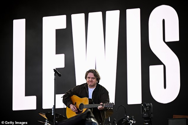 In his emotional speech, Lewis said: ' Glastonbury it’s good to be back. Won’t say too much up here today as if I do I might start crying,'