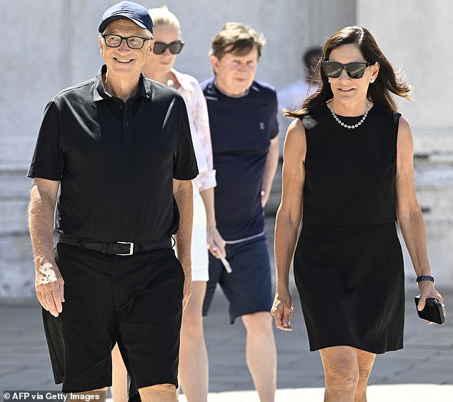 Weather confused?! Bill Gates and his partner Paula Hurd explored Venice Thursday, as he kept things very simple in a pair of long black shorts and matching polo t-shirt