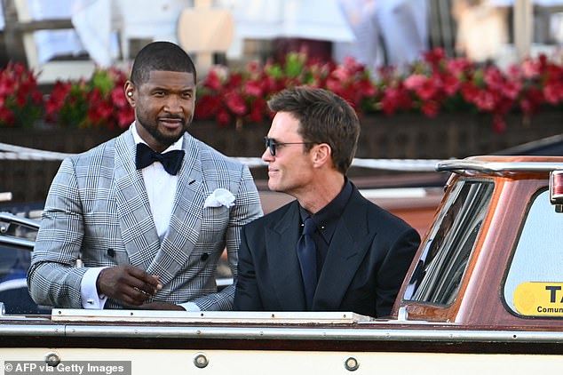 US singer Usher Raymond IVl (L) and US football player Tom Brady leave the Gritti Palace Hotel on the wedding day of Amazon founder Jeff Bezos with Lauren Sanchez, in Venice on June 27, 2025
