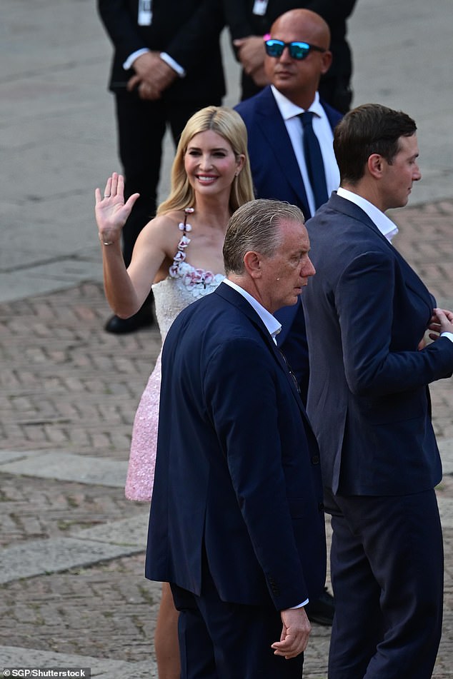 Ivanka Trump waves to a crowd as she arrives in Venice prior to the wedding of the century