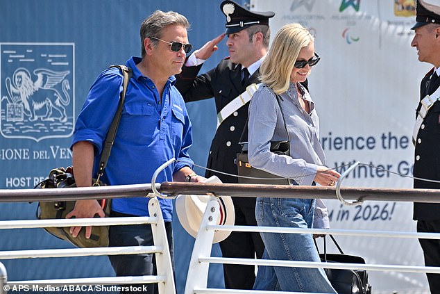 Lachlan Murdoch and Sarah Murdoch arriving at Venice airport ahead of the wedding