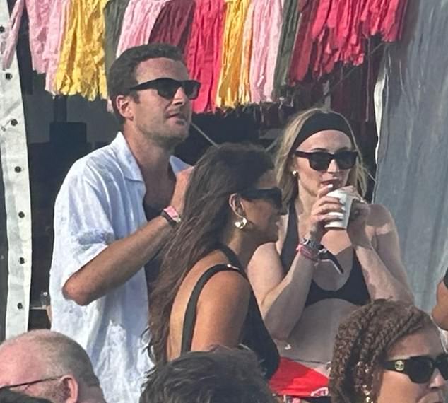 Onlookers said the couple looked 'smitten' with one another