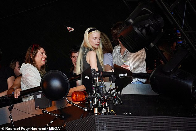 She looked effortlessly chic as she joined pals in the VIP section for the show