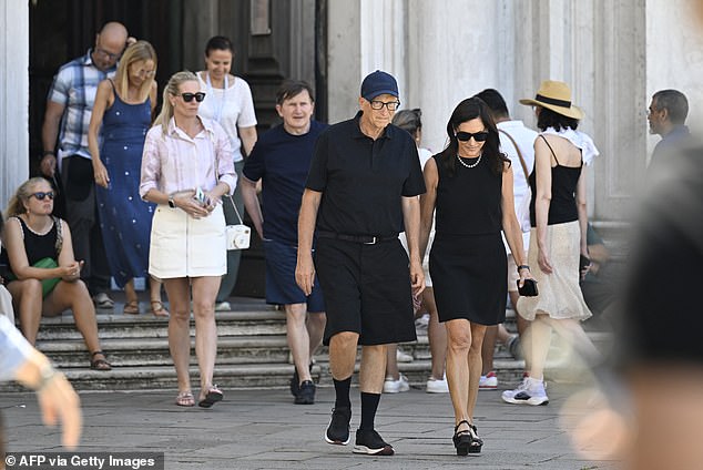 Despite being far away from Silicon Valley, Gates still looked the part of tech entrepreneur and wore a simple black polo shirt with black shorts and a matching belt. Hurd, who has been dating Gates since 2023, wore a simple two-piece skirt set and a pair of heeled scandals