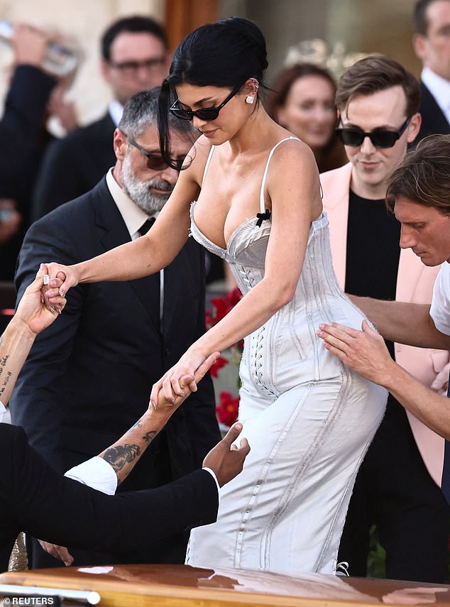 Kylie Jenner seems to have missed one of the most important wedding memos of all - don't wear white