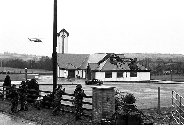 British soldiers seen on guard after IRA terrorists attacked the Coalisland police station in 1992