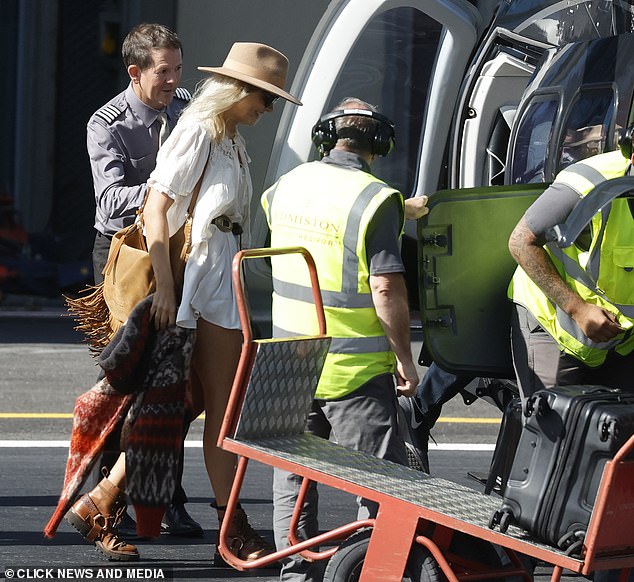 Residents of neighbouring Pilton in Somerset are furious at the number of choppers ferrying A-listers over their farms