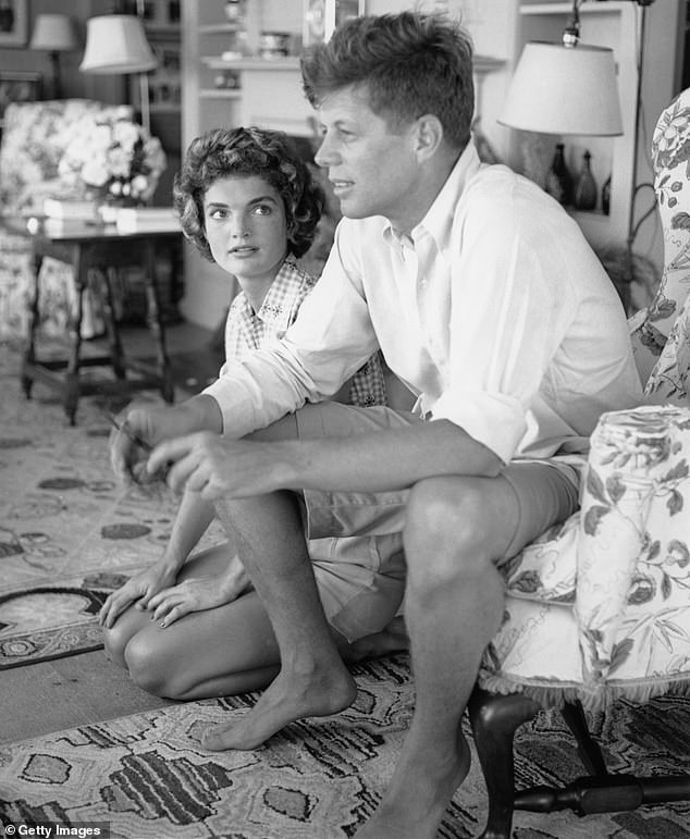 Kennedy pictured with his then fiancee Jacqueline Bouvier while on holiday at the family compound in Hyannis Port, Massachusetts in 1953