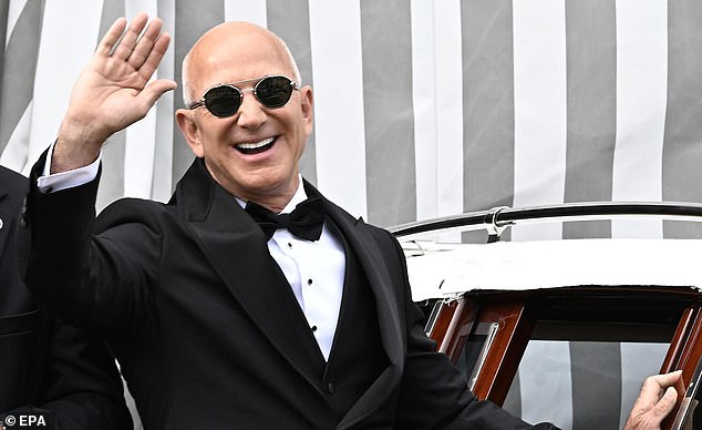 Amazon founder Jeff Bezos waves to the crowd as he leaves his hotel in Venice, Italy, 27 June 2025