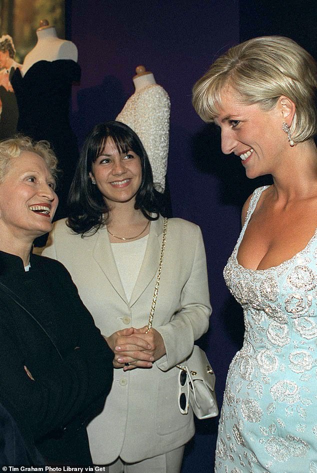 Diana, wearing an embroidered mini dress by Catherine Walker, chatted to Stambolian at the auction