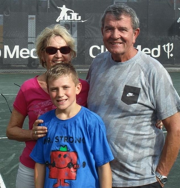 Draper's grandfather Chris (right, with wife Brenda) watched him at the French Open this year