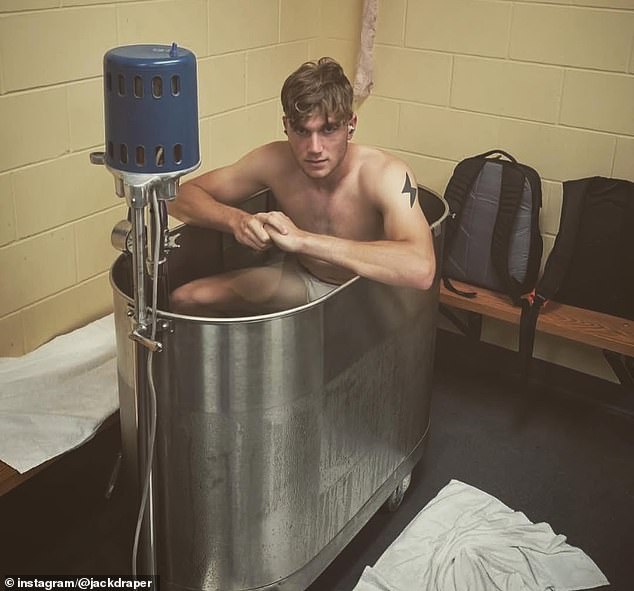 Draper, pictured in an ice bath, has worked hard to make sure he is in top shape physically